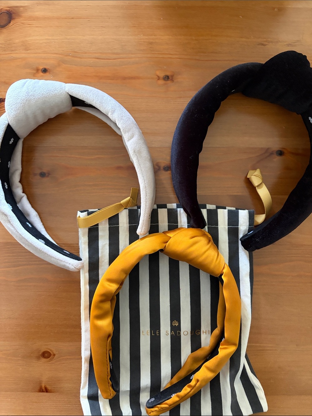 LELE SADOUGHI Knotted Headband Bundle and Branded Bags